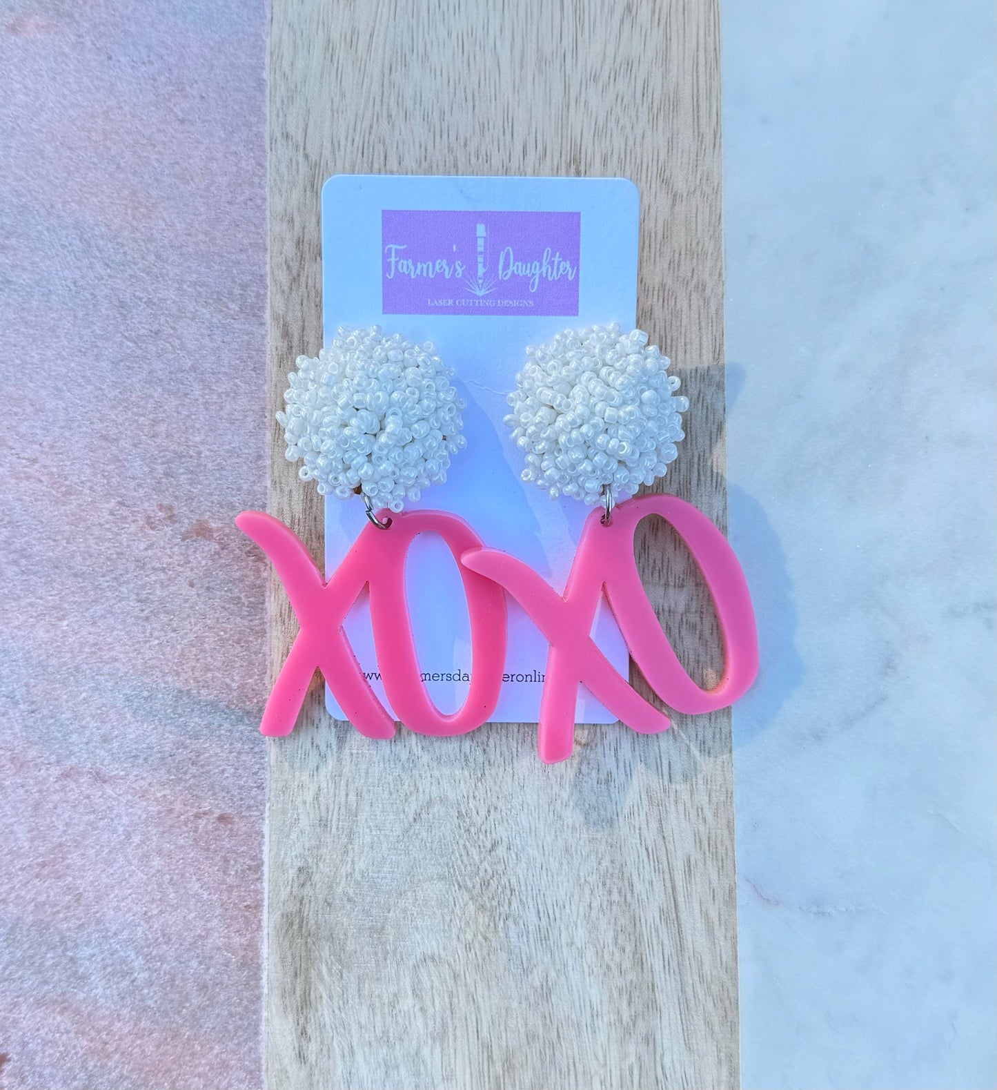 xoxo pink acrylic earrings image 0